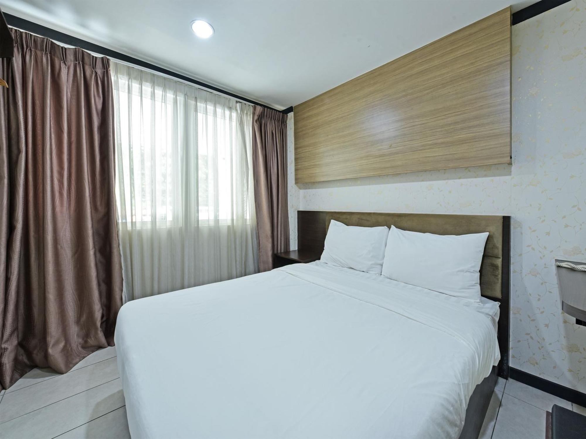 Oyo 91009 One Enigma Hotel Куала-Лумпур Экстерьер фото